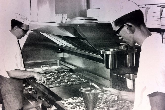 Griff's cooks working the grill in a vintage Griff's kitchen